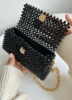 Elegant black beaded handbag